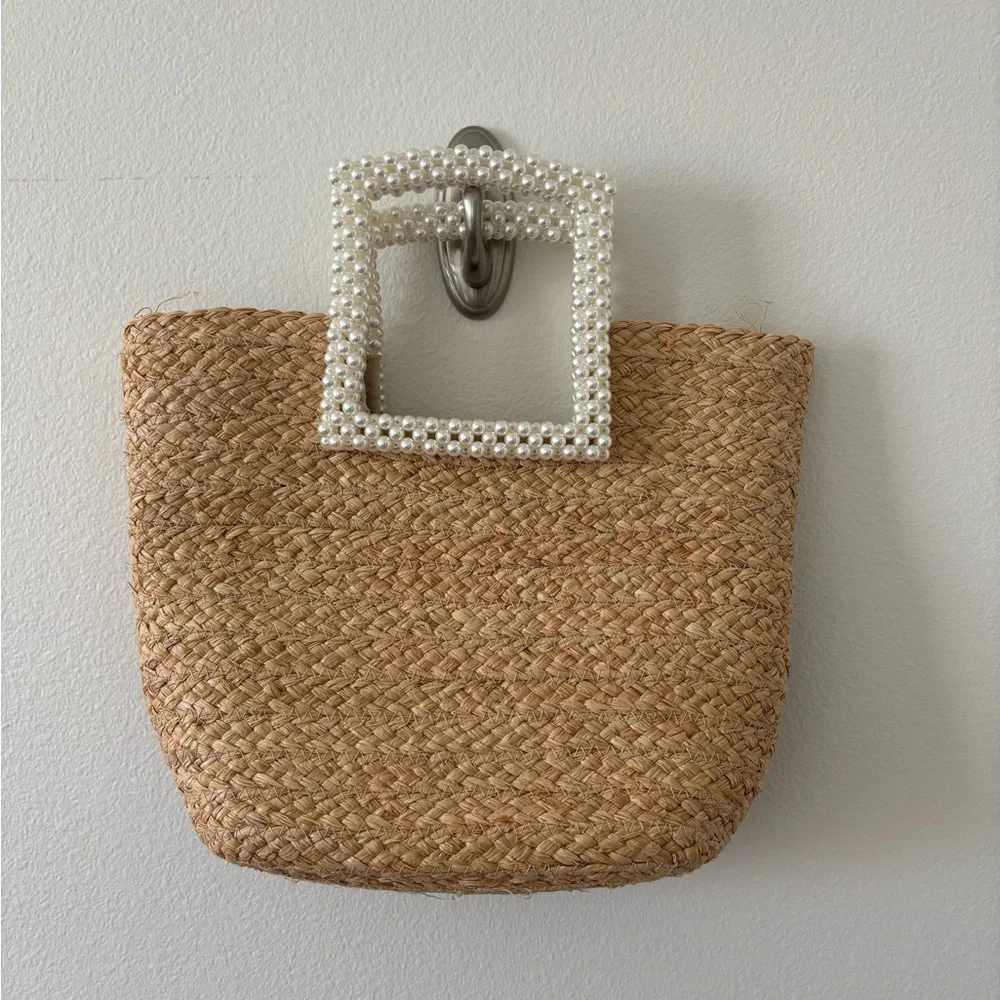 Elegant Tan Woven Bag with Pearl Accent - Picture 1 of 4